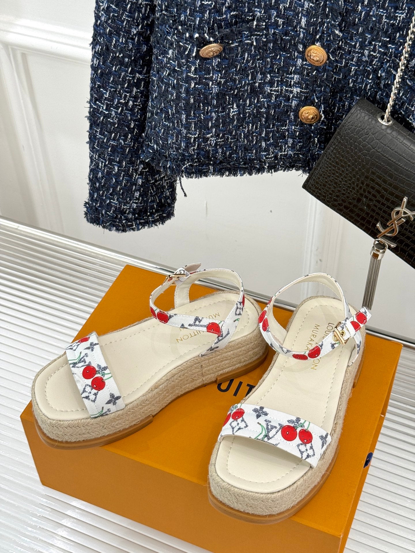 Espadrille sandals with white straps and red cherry print, open toe, braided sole.