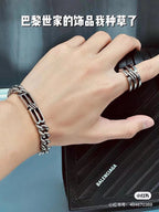 Chain bracelet worn on wrist with interlocking link design and clasp