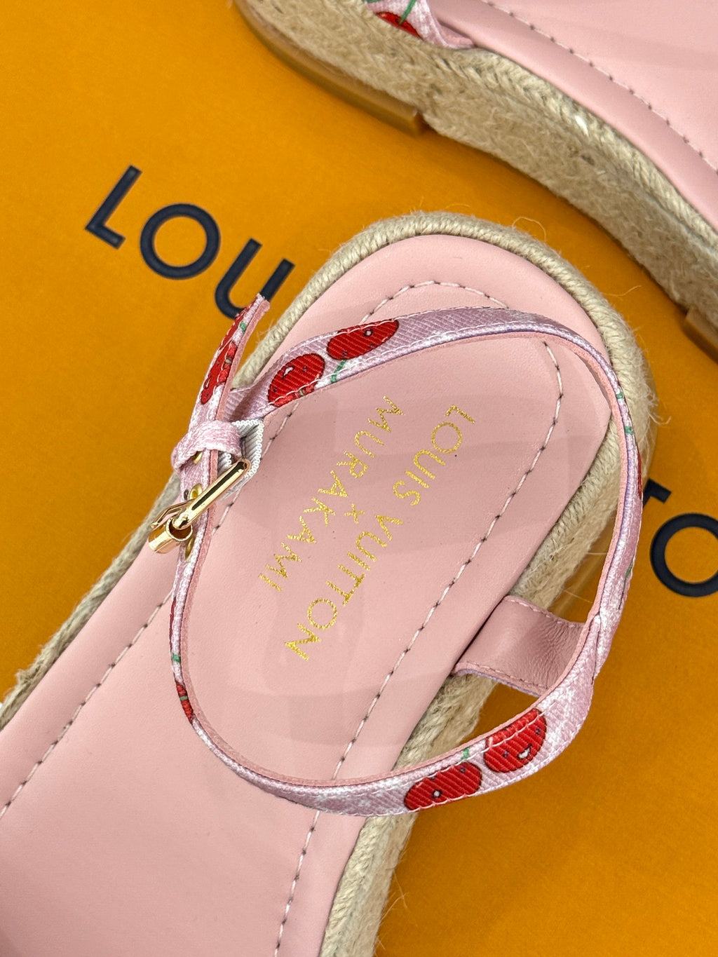 Louis Vuitton ladies pink espadrille sandal with cherry-print strap and gold hardware