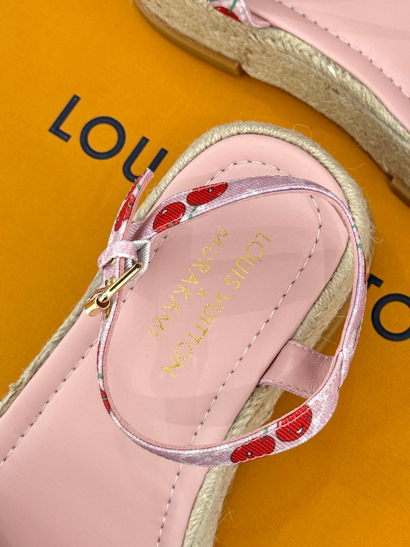Louis Vuitton ladies pink espadrille sandal with cherry-print strap and gold hardware