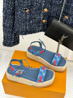 Blue espadrille sandals with cherry-print cross straps and braided sole
