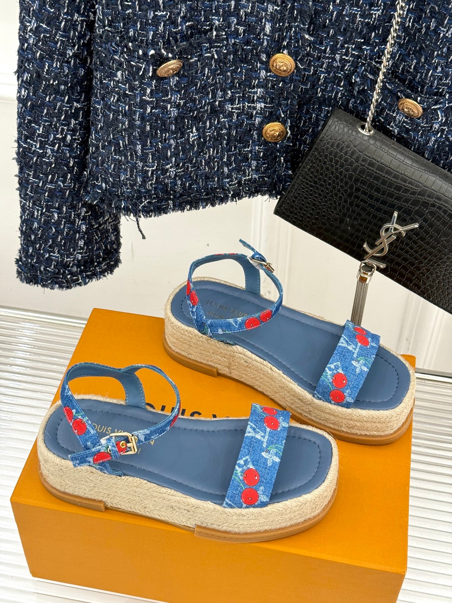Blue espadrille sandals with cherry-print cross straps and braided sole