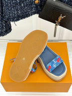 Blue espadrille sandals with cherry-print straps and tan outsole soles