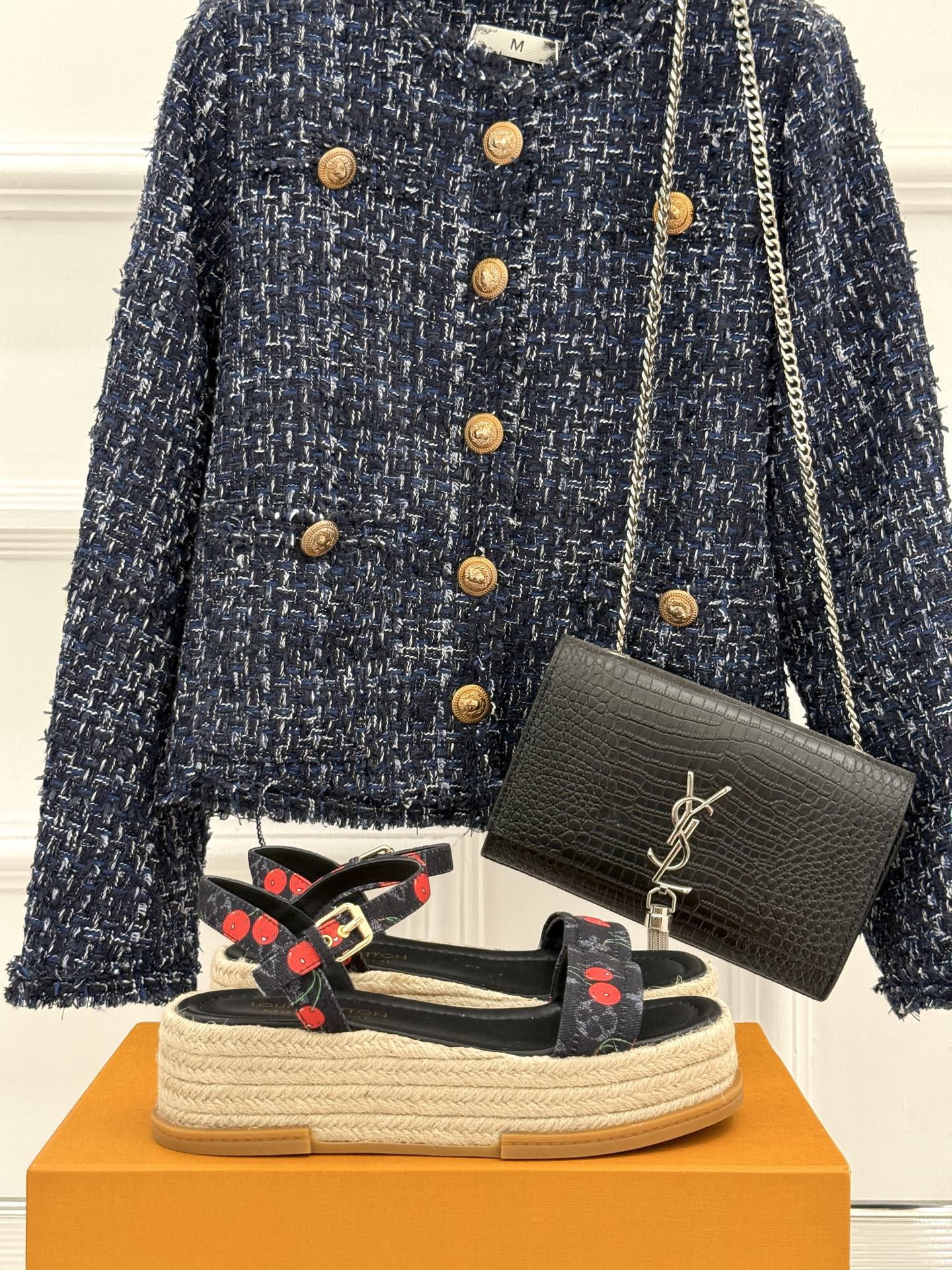 Louis Vuitton black platform espadrille sandals with cherry-pattern straps and ankle buckle.