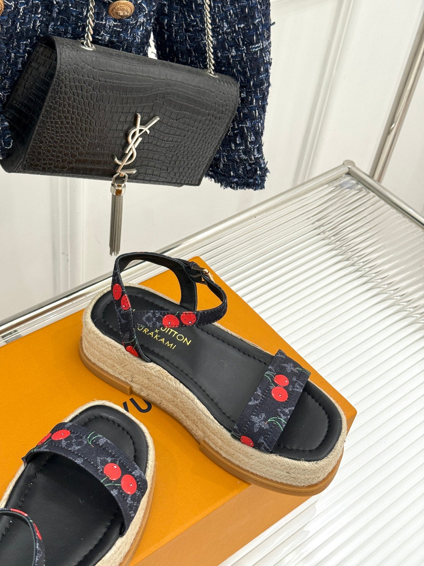 Louis Vuitton black platform espadrille sandals with cherry-print straps and ankle strap.