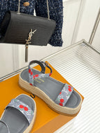 Grey espadrille slide sandals with cherry-print straps and tan woven sole