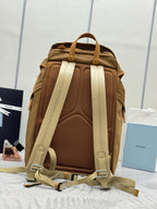 Prada tan backpack back view with padded mesh panel and adjustable shoulder straps
