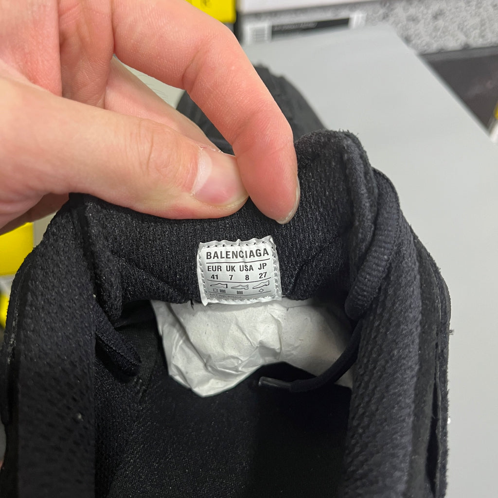 Inside shoe label reading Balenciaga with size info on fabric