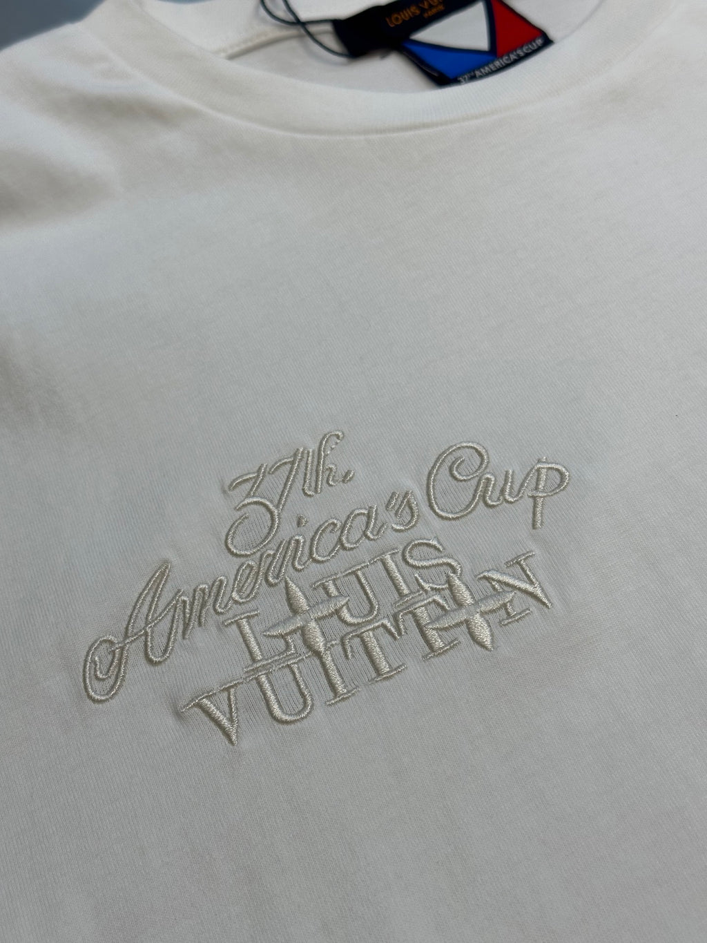 White Louis Vuitton T-shirt with embroidered “America’s Cup” script logo