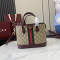 Gucci handbag with GG canvas, burgundy trim, green and red web stripe, top handles.
