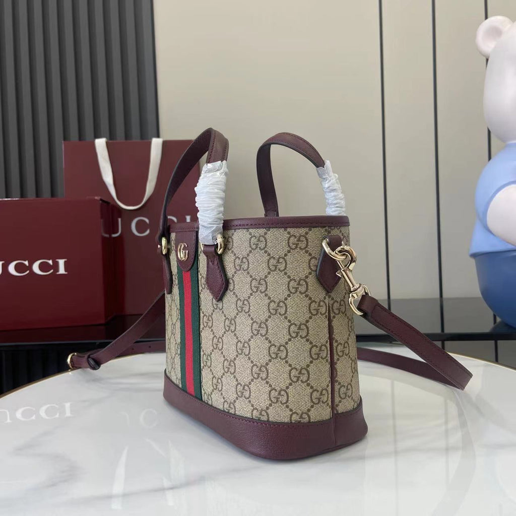Gucci handbag with GG canvas, burgundy leather trim, green and red web stripe, strap.