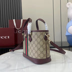Gucci handbag with GG canvas, burgundy leather trim, green and red web stripe, strap.