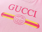 Pink short-sleeve T-shirt with large Gucci logo and striped GG graphic
