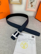 Hermes belt in dark blue with silver-tone buckle and single keeper, shown laid out