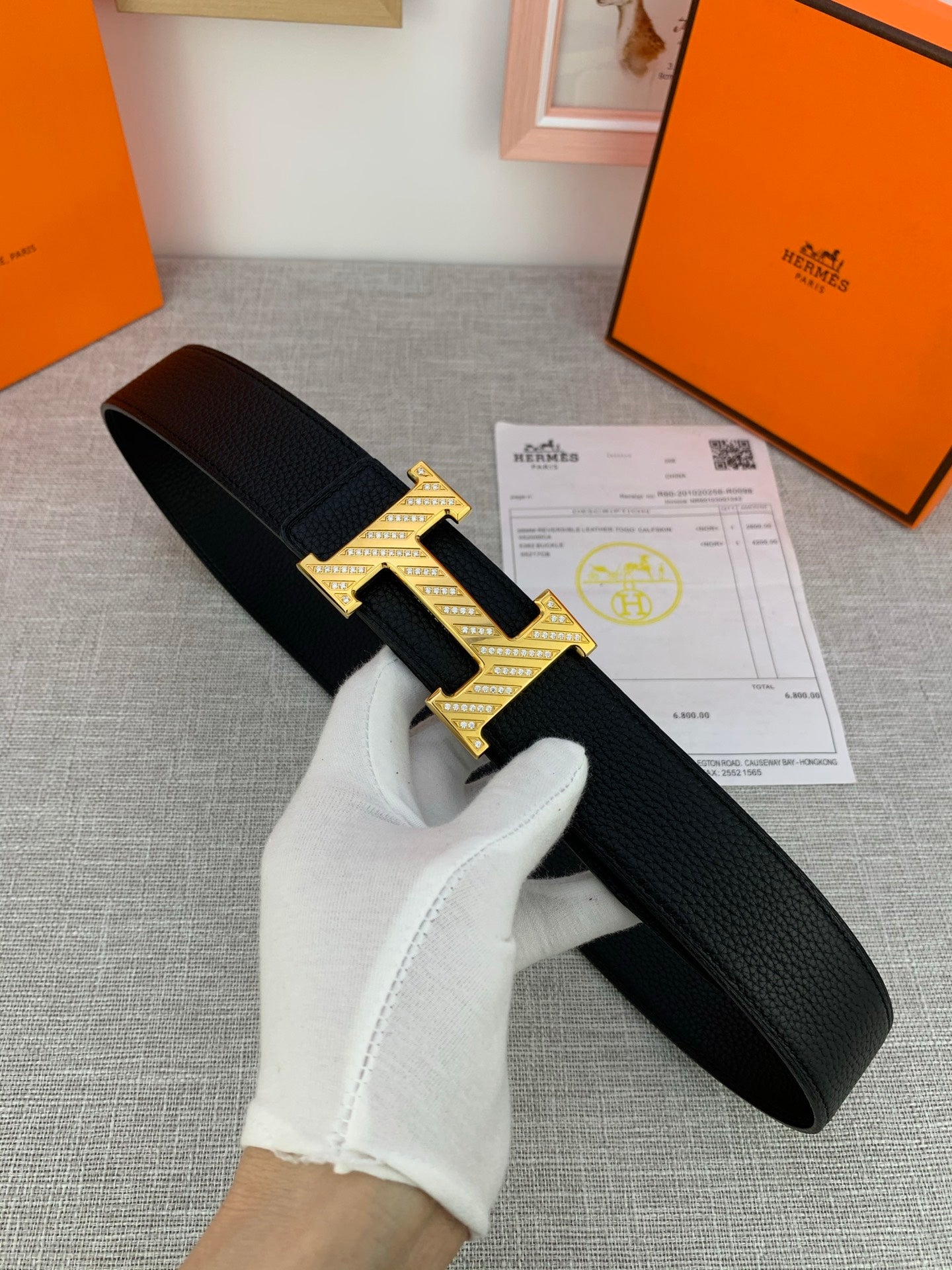 Hermes belt, black textured leather with gold-tone H buckle