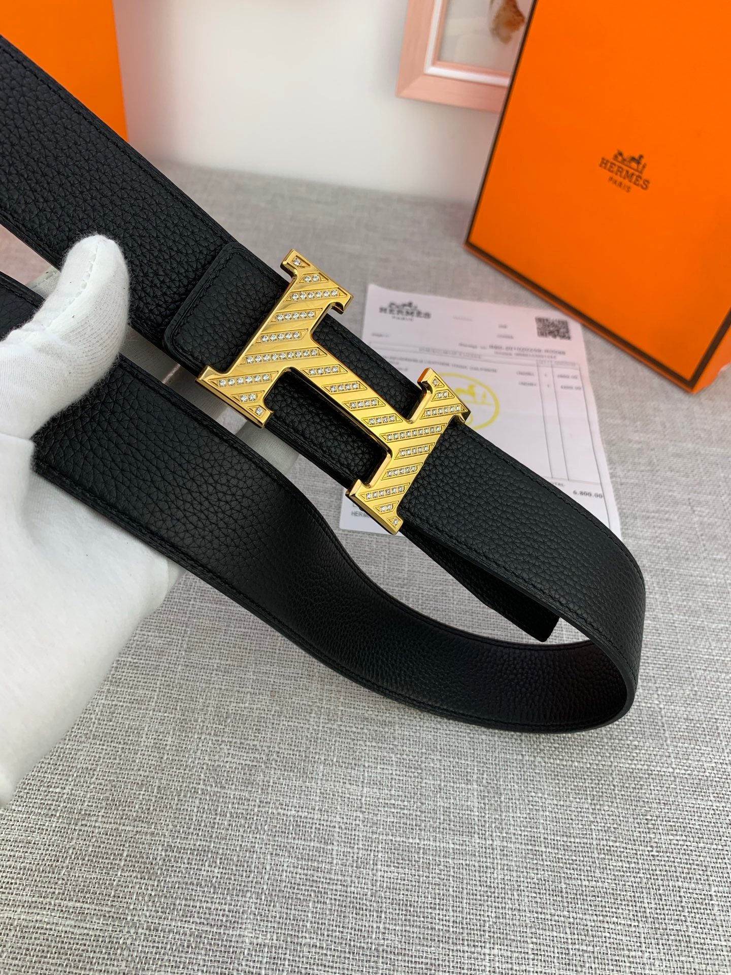 Hermes belt, black leather with gold-tone H buckle and keeper strap