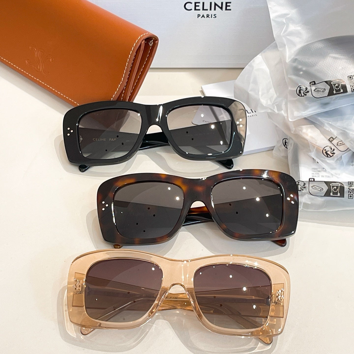 Celine sunglasses set with black, tortoise, and clear frames, each with dark lenses