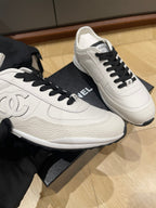Chanel unisex low-top sneakers, white leather with black laces and embroidered side logo