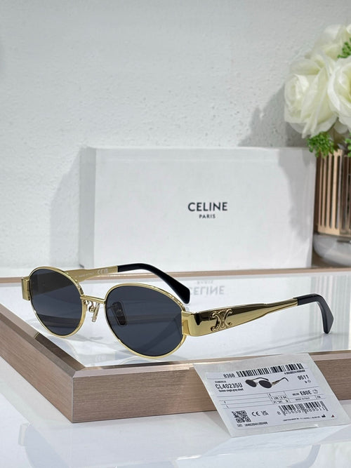 Round sunglasses, gold frame, dark blue lenses, black temple arms