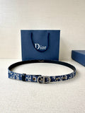 Dior belt with blue monogram strap, black edges, and silver CD buckle.