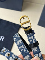 Dior belt end: blue logo strap with gold-tone buckle and black leather keeper