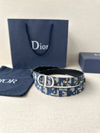 Dior belt with blue logo-pattern strap and black leather edge, silver buckle