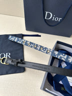 Dior belt with blue monogram strap, gold CD buckle and leather tag