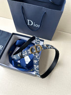 Dior belt in box: blue monogram strap, gold CD buckle and black leather ends