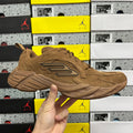 Brown suede Balenciaga unisex sneaker with lace-up front and logo side panel
