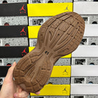 Brown suede Balenciaga unisex sneaker outsole with deep traction tread pattern
