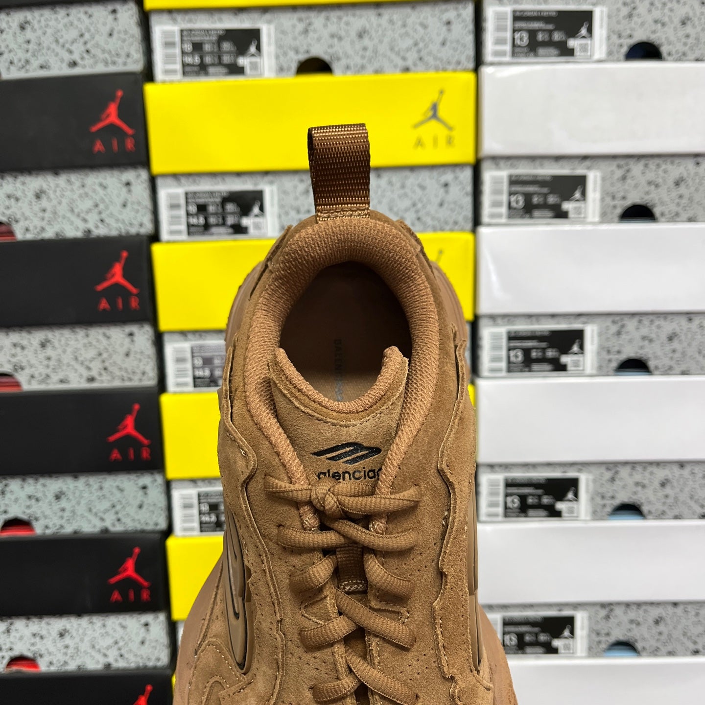 Brown suede Balenciaga unisex sneaker back view with woven heel pull tab