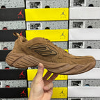 Brown suede Balenciaga unisex sneaker side view with lace-up and logo panel