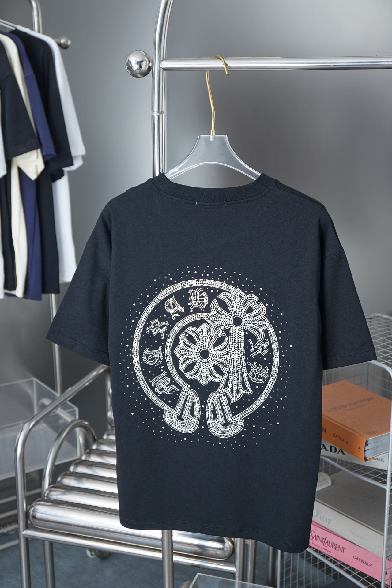 Dark navy short-sleeve crewneck T-shirt with large circular rhinestone elephant graphic