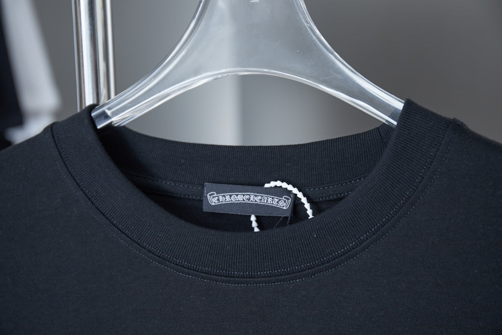 Dark navy crewneck T-shirt neckline with rib collar and small inner logo label