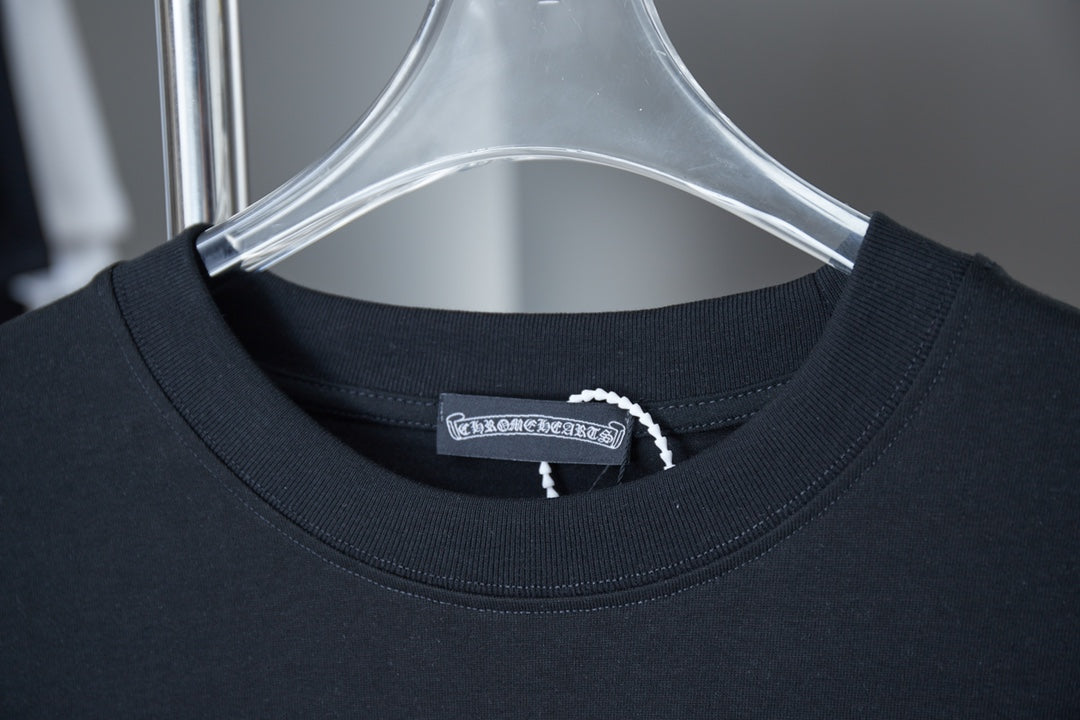 Dark navy crewneck T-shirt neckline with rib collar and small inner logo label