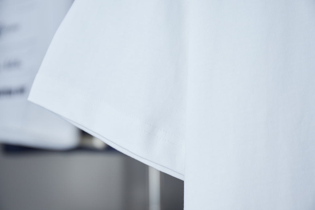 White short-sleeve T-shirt hem with clean straight cut