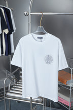 White short-sleeve T-shirt with silver rhinestone medallion on left chest