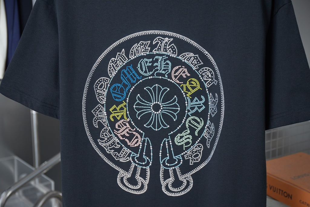 Black T-shirt with large circular rhinestone graphic on back