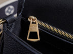 Louis Vuitton bag zipper pull, gold tone with monogram charm