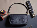 Louis Vuitton crossbody bag, dark embossed monogram, shoulder strap and gold hardware