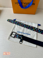 Louis Vuitton belt laid flat with multicolor monogram strap and silver buckle