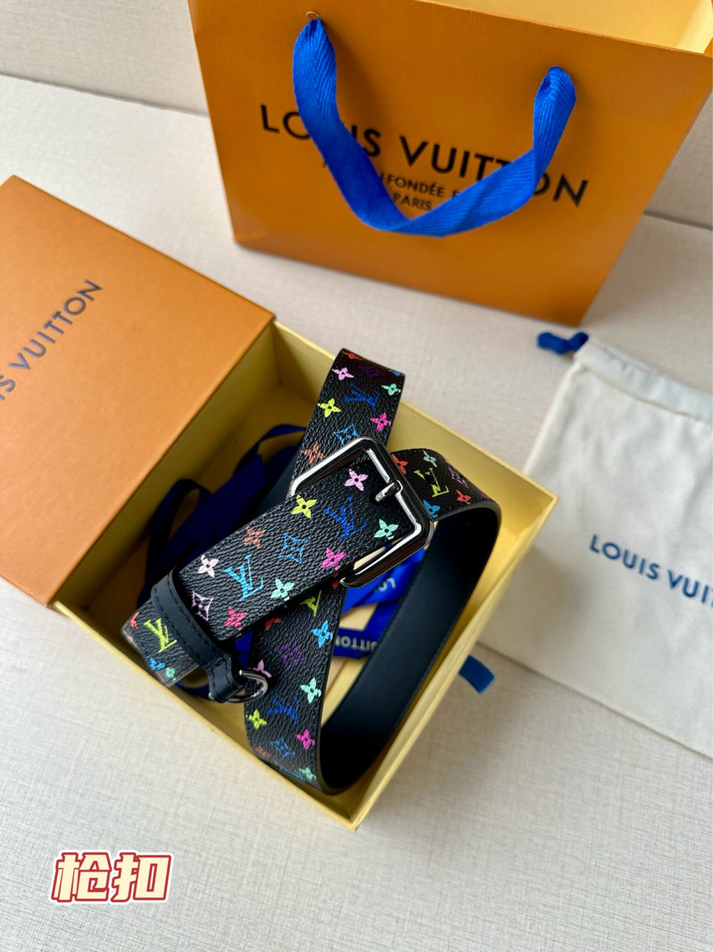 Louis Vuitton belt with multicolor monogram strap and silver buckle, dark blue