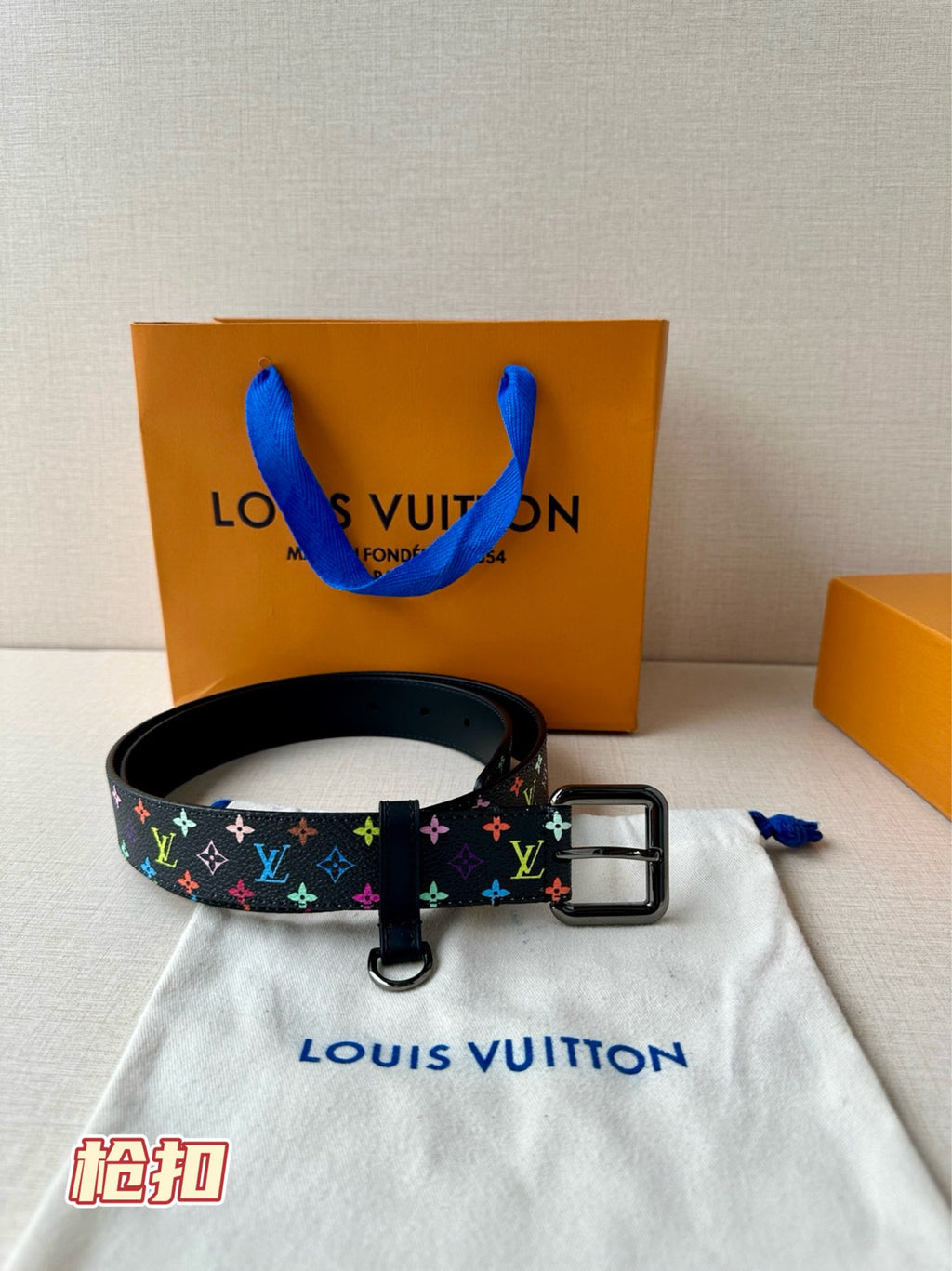Louis Vuitton belt with multicolor monogram strap and silver buckle, dark blue