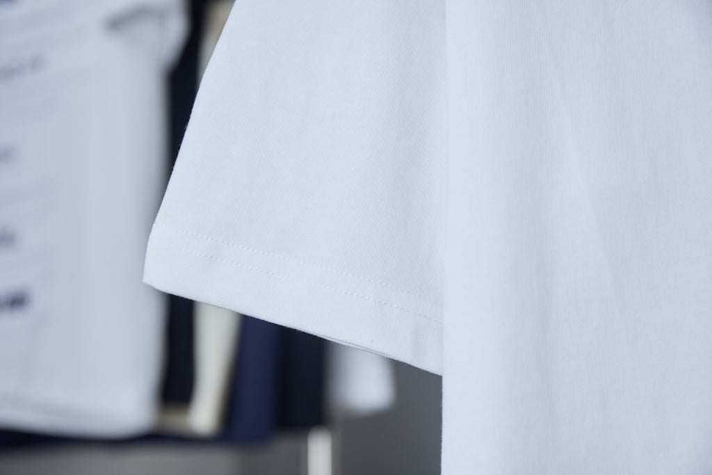 White short-sleeve T-shirt sleeve and hem detail