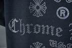 Dark blue T-shirt rhinestone-style 'Chrome Hearts' lettering with circular R motif