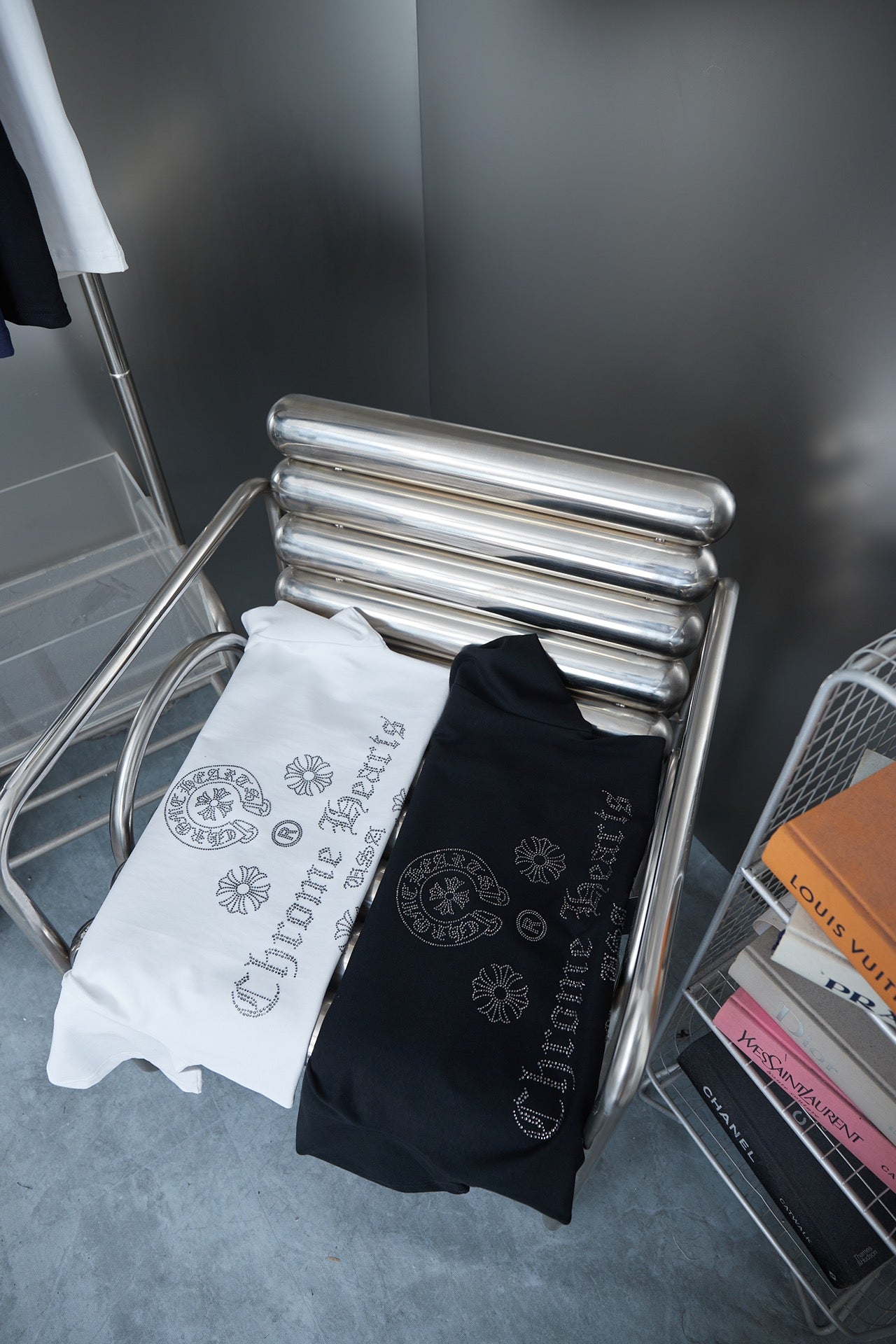 Chrome Hearts T-shirts, white and black, folded with rhinestone text