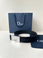 Dior belt with dark strap and silver rectangular buckle plate with Dior emblem