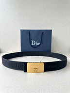 Dior logo belt with dark textured strap and gold rectangular buckle