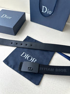 Dior belt with dark blue strap and Dior logo print near the buckle
