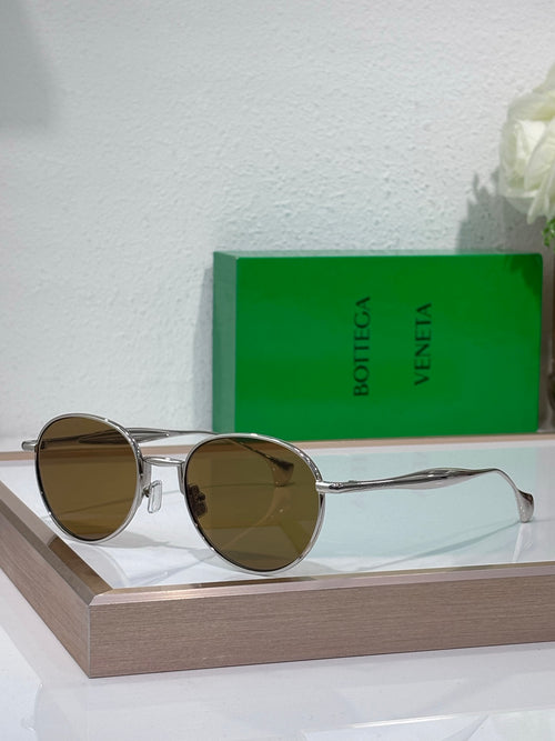 Bottega Veneta round sunglasses with brown lenses and silver metal frame, slim temples